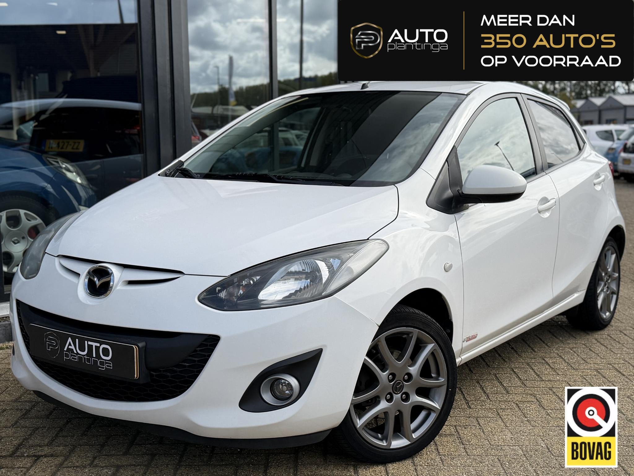Mazda 2 1.3 Hanabi 84PK | 2e Eigenaar | NL AUTO | NAP | Bi-F, Voorwielaandrijving, Euro 5, Stof, Zwart