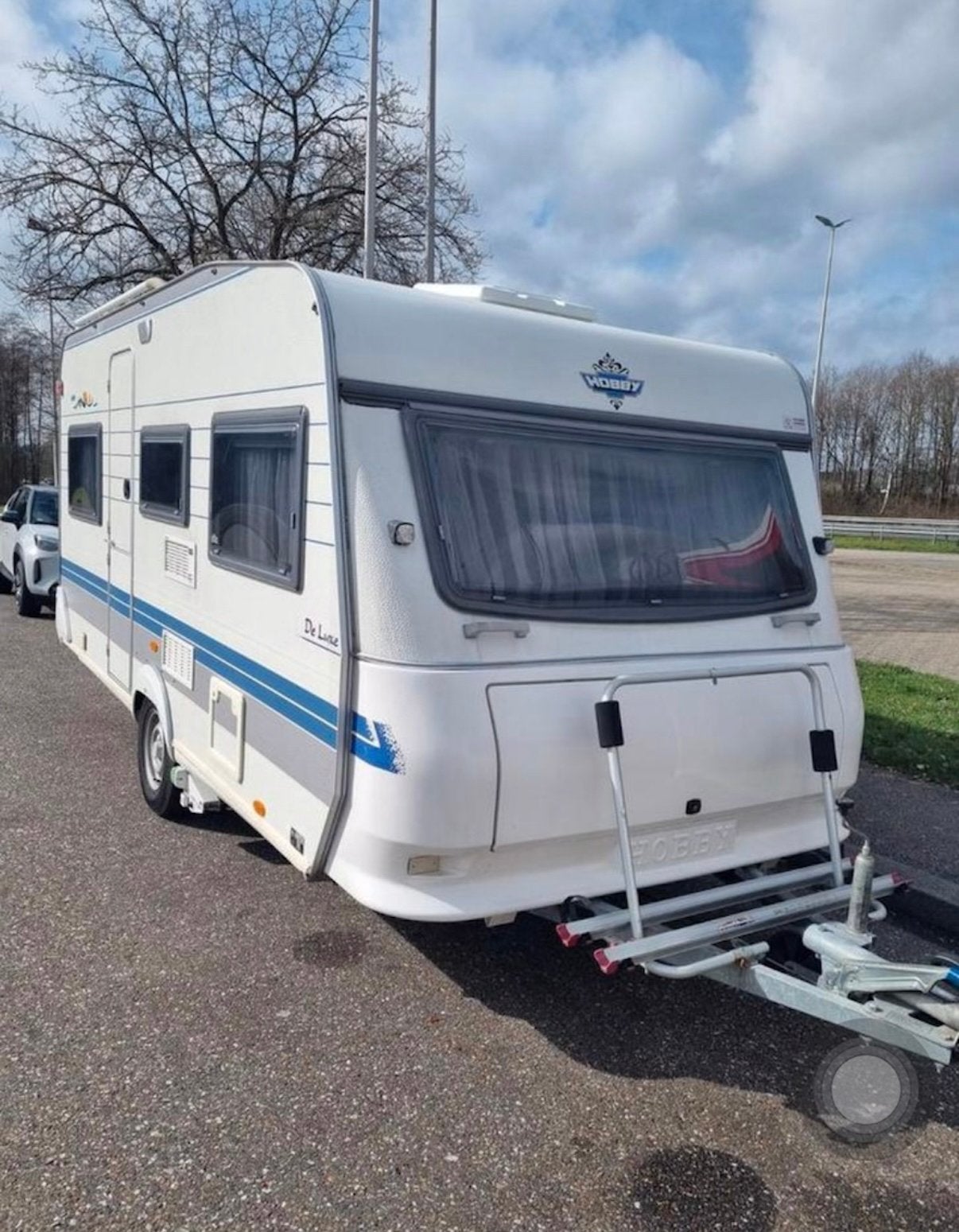 Caravan hobby deluxe 450 uf met mover + fietsen rek + netjes, Vast bed, Rondzit, Hobby, Particulier