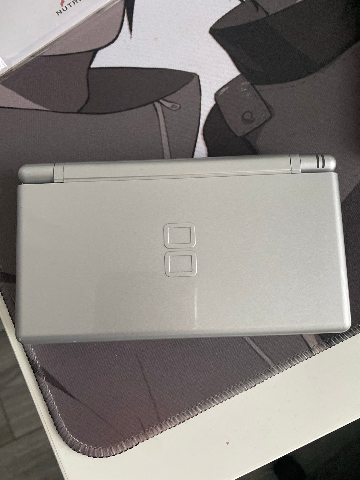 Nintendo DS lite - Zilver (Nieuw), Spelcomputers en Games, Ophalen of Verzenden, Zo goed als nieuw, Zilver, DS Lite