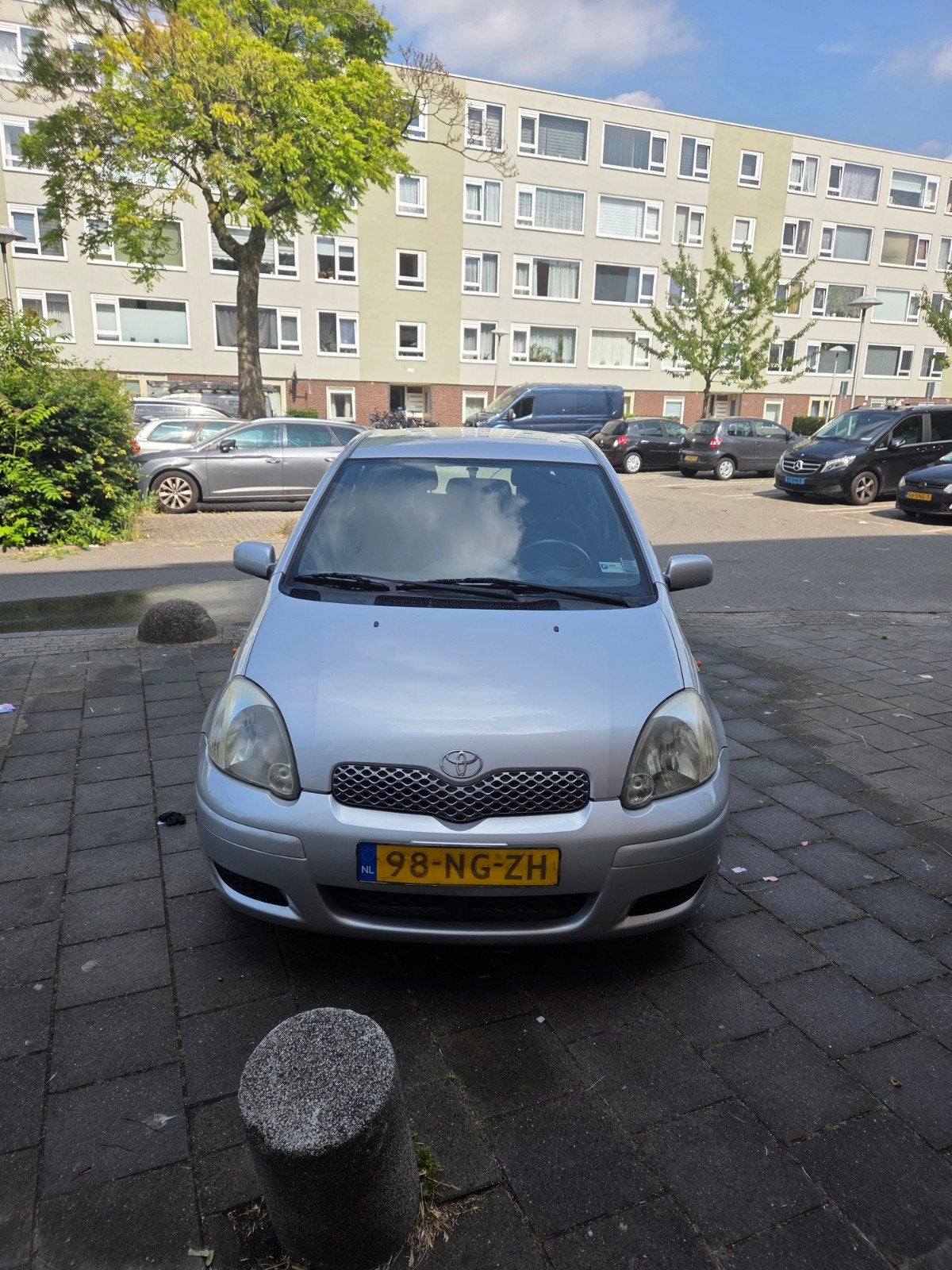 Toyota Yaris 1.3 16V Vvti 5DR AUT 2003 Grijs, Auto's, Stof, 4 cilinders, 400 kg, Origineel Nederlands