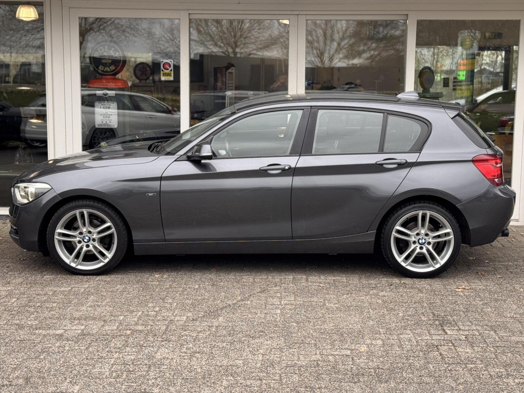 118i 170pk 6bak,Sport Line,Xenon,Sportstoelen,Clima,Navi,PDC, Auto's, 1-Serie, Euro 5, Gebruikt, Zwart