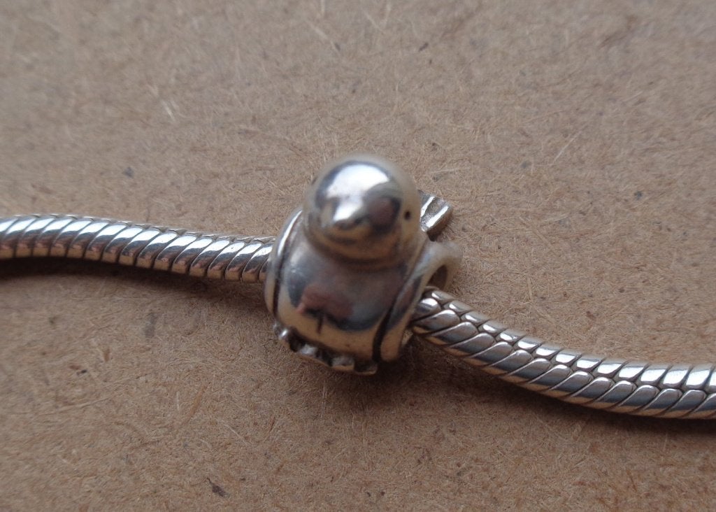zilveren Pandora bedel vogel  [852], Sieraden, Tassen en Uiterlijk, Overige merken, Verzenden, Zo goed als nieuw, 1 bedel