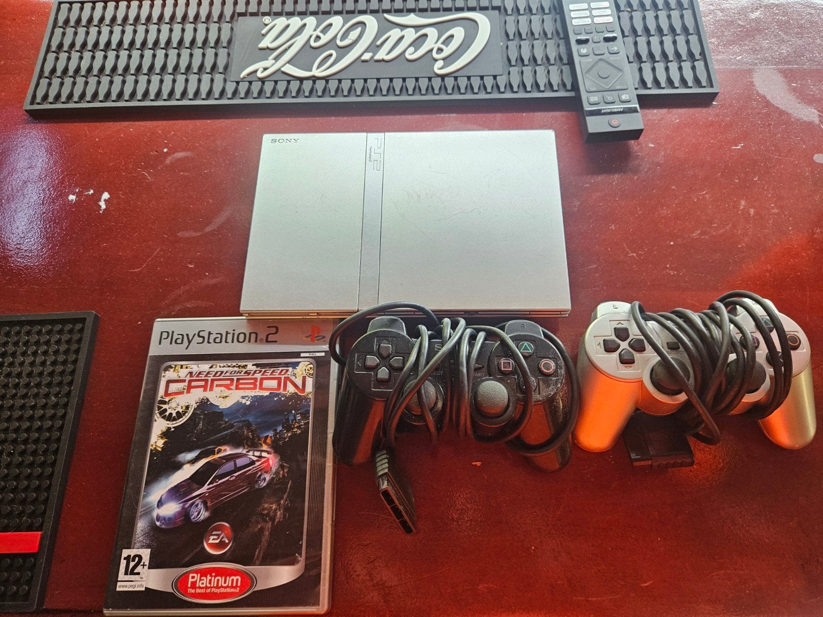 Ps2 2 controlers 1 spel, Spelcomputers en Games, Met 2 controllers, Ophalen of Verzenden, Zilver, Slim