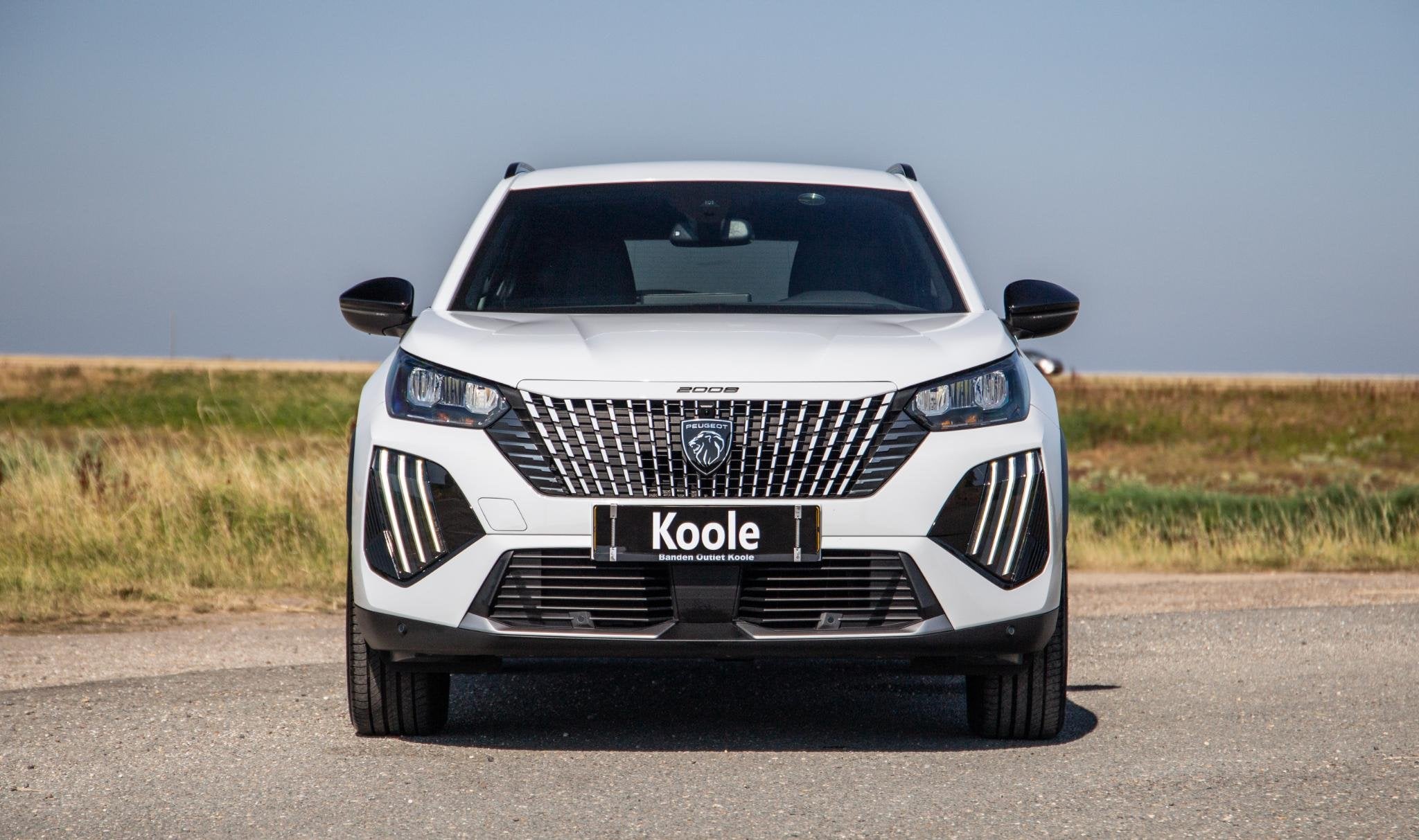 Peugeot e-2008 EV Allure 54 kWh ADAPTIVE CRUISE / CARPLAY /, Auto's, Dealer onderhouden, Gebruikt, Automatische klimaatregeling