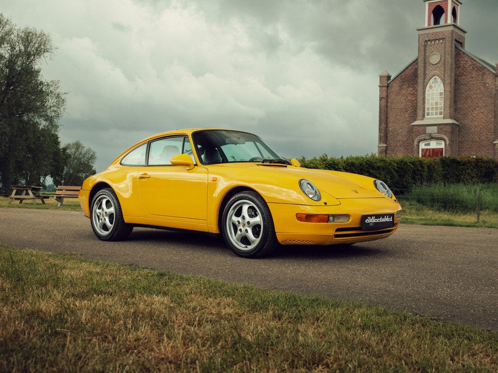 Porsche 911 3.6 Coupé Speedyellow (bj 1996, automaat), Automaat, Achterwielaandrijving, Zwart, 4 stoelen