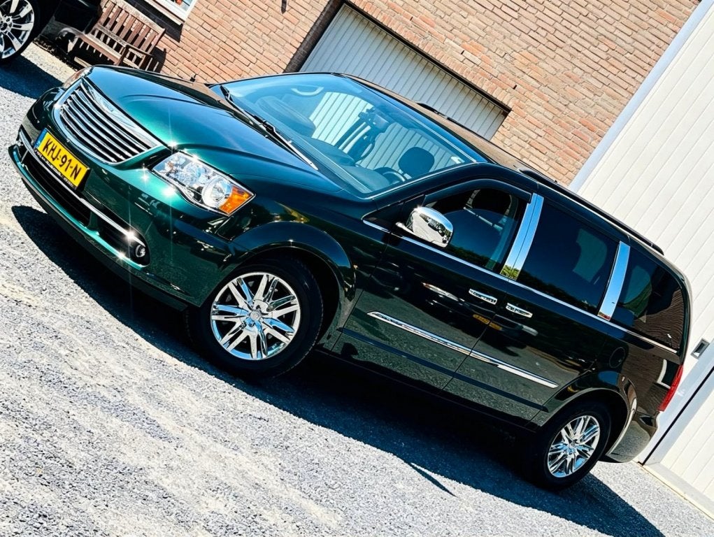 Chrysler Grand Voyager 3.6 V6 LIMITED J.DAIMLER EMERALD-GREE, Auto's, Chrysler, Dealer onderhouden, Gebruikt, Zwart, Grand Voyager