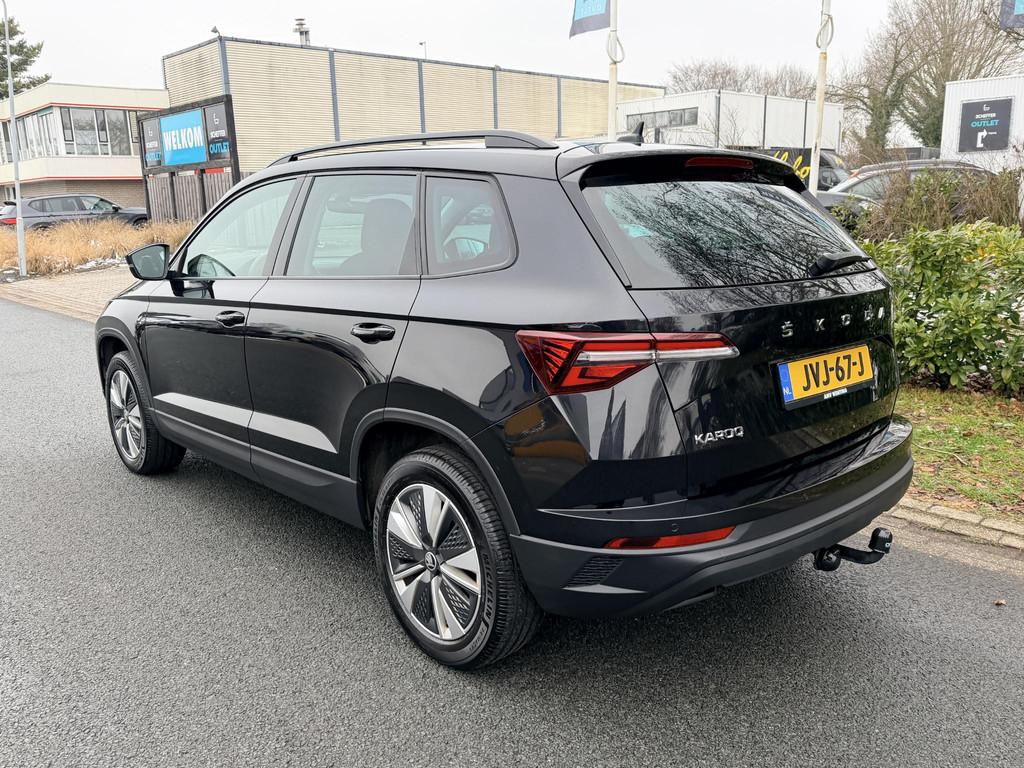 Skoda Karoq 1.5 TSI ACT 150PK DSG Trekhaak•Navi, Auto's, Skoda, Stof, 4 cilinders, Zwart, Karoq