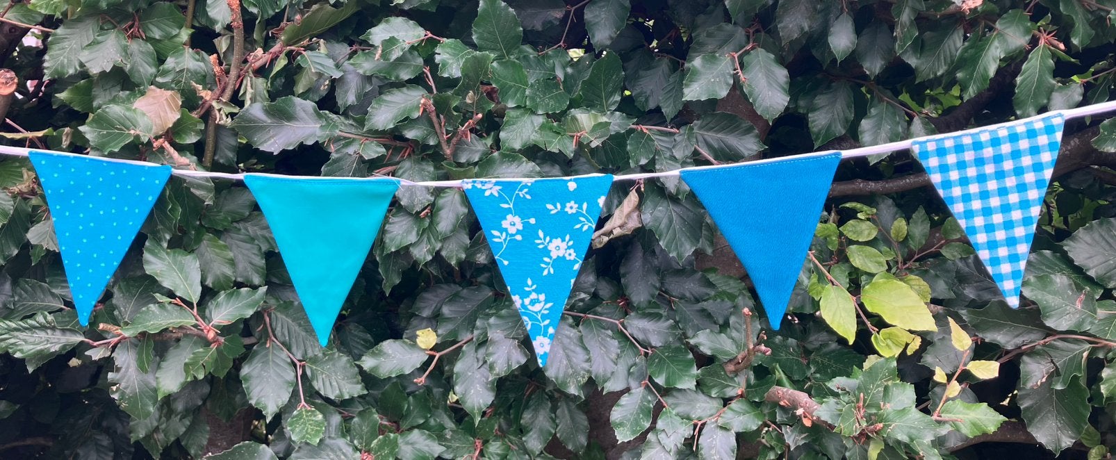 Slinger van stof petrol blauwe kleuren, Hobby en Vrije tijd, Feestartikelen, Ophalen of Verzenden, Versiering