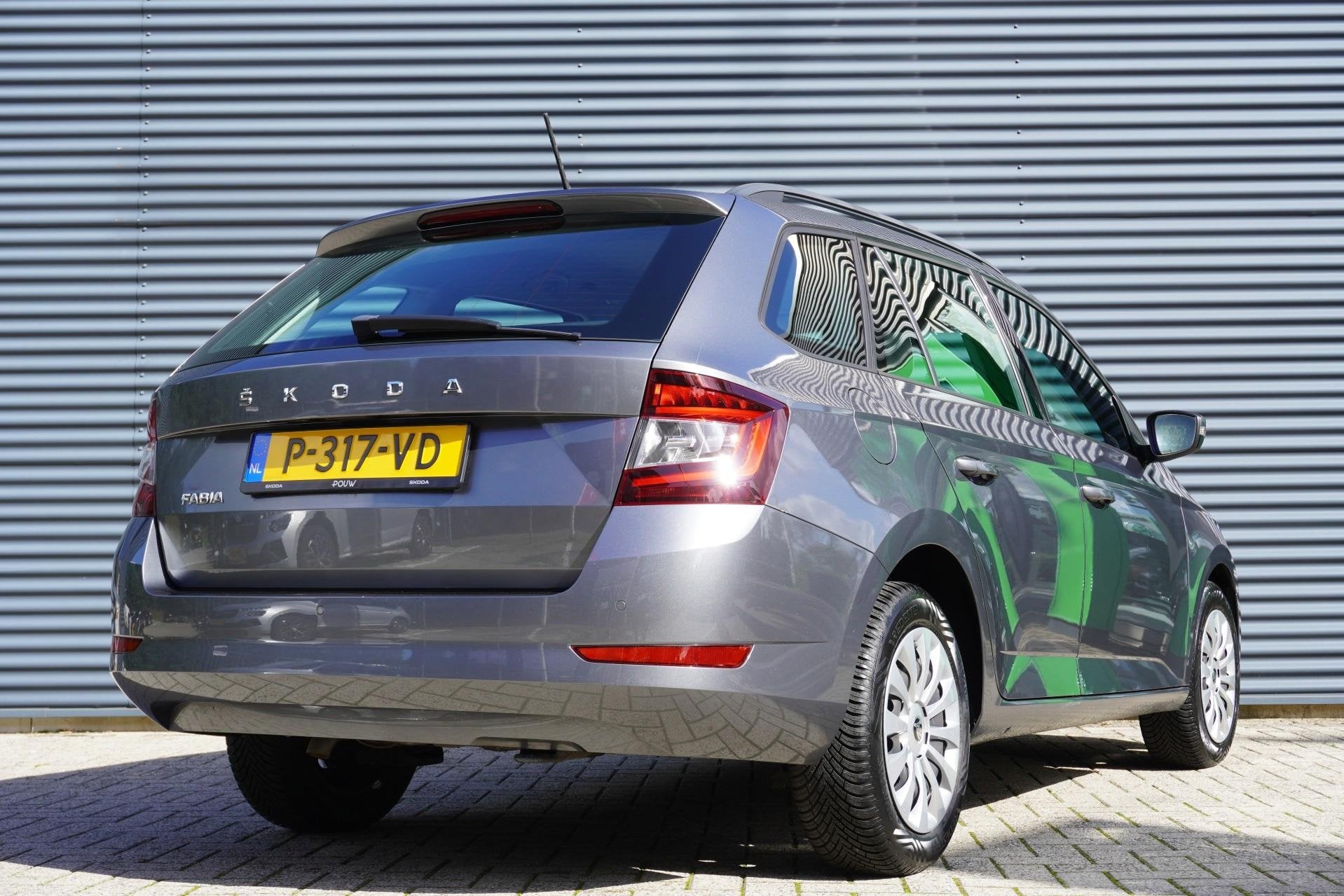 Skoda Fabia Combi 1.0 TSI 95pk Ambition | Airco | Navigatie, Auto's, Voorwielaandrijving, 12 maanden, Stof, Gebruikt
