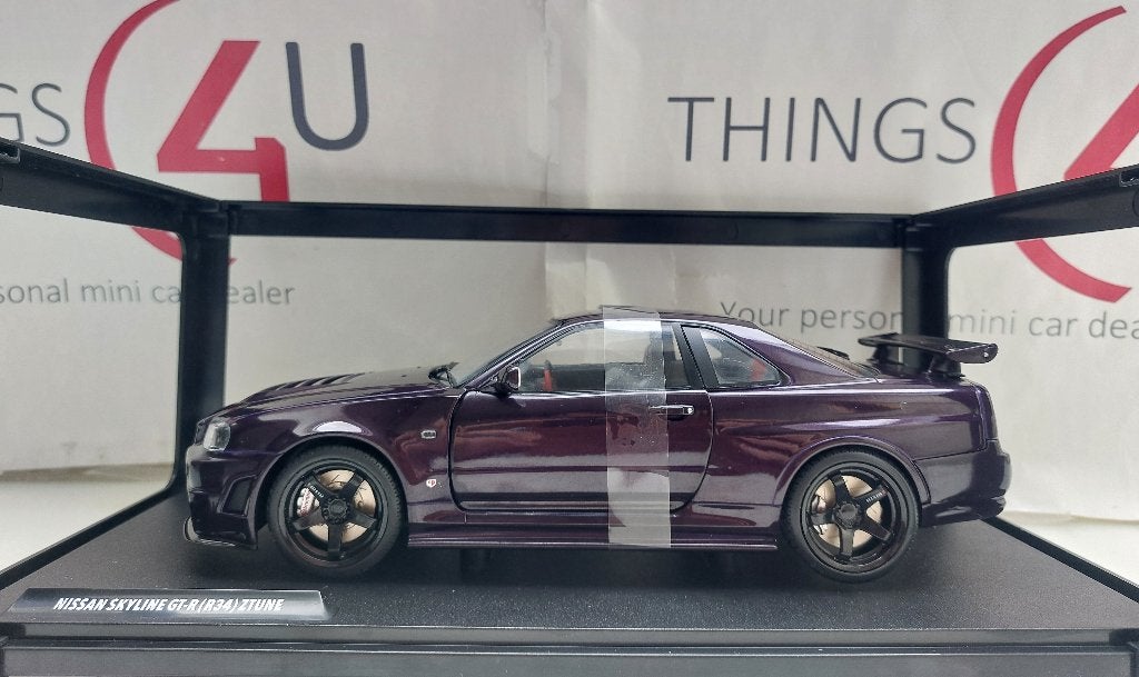 Solido 1:18 Nissan Skyline (R34) GT-R Z Tune 1999 violet, Hobby en Vrije tijd, Modelauto's | 1:18, Ophalen of Verzenden, Nieuw