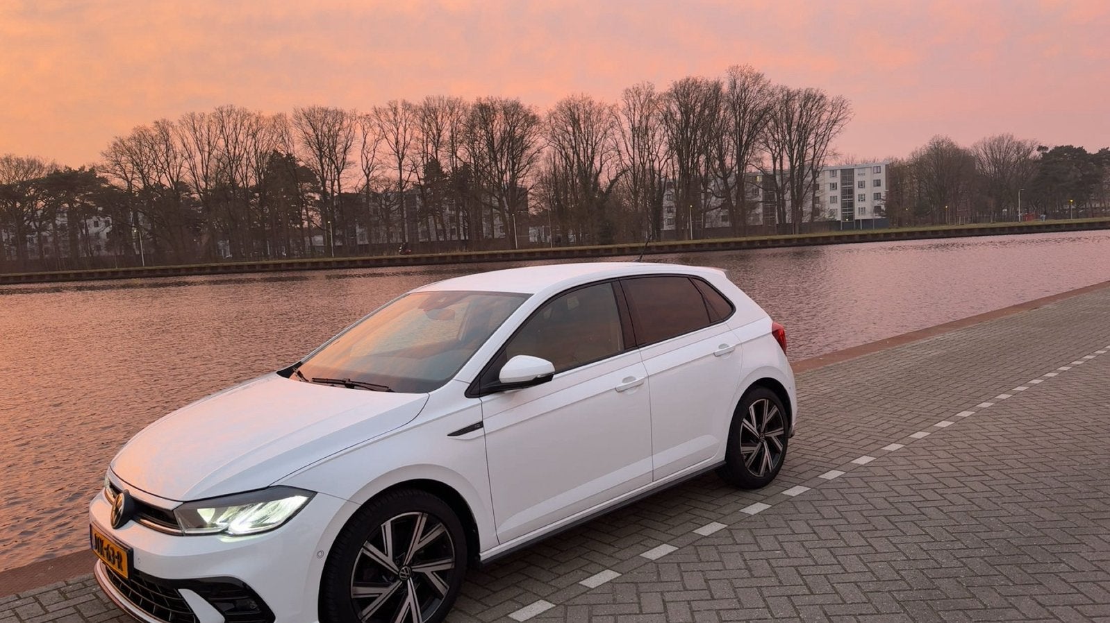 Volkswagen Polo 1.0 TSI 110pk Dsg-7 2022 Wit, 2x r-line, Auto's, Volkswagen, Stof, Wit, 3 cilinders, 1100 kg