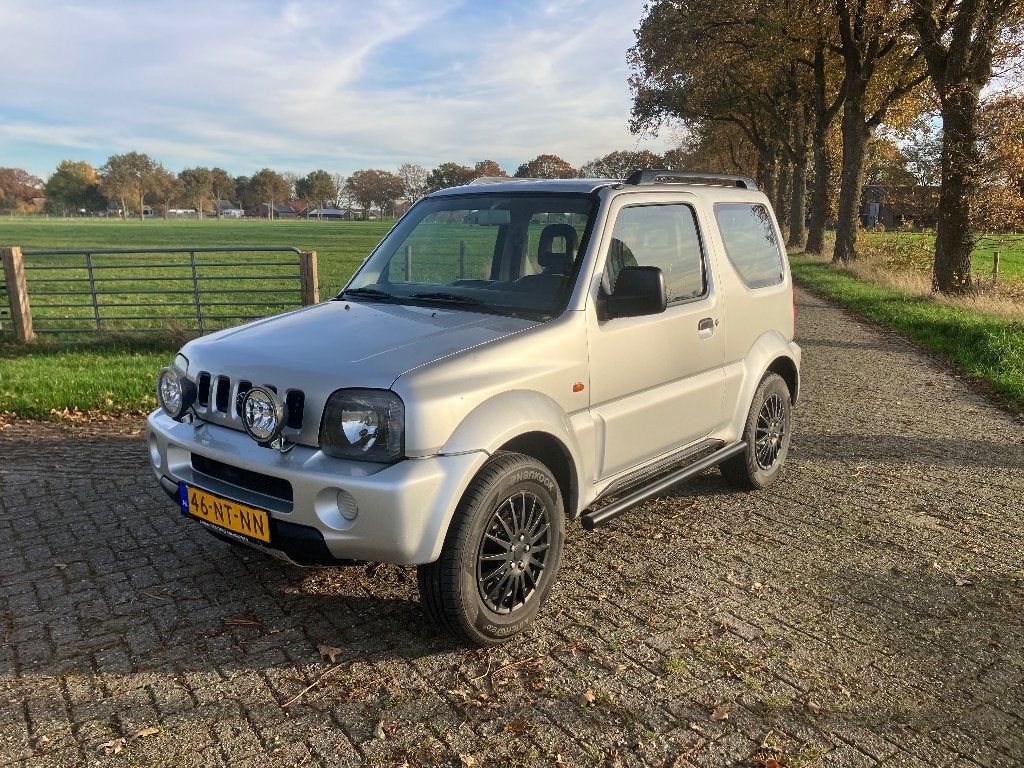 Suzuki Jimny 1.3 JX 4WD 2004 Grijs Airco, Auto's, Suzuki, 13 km/l, Stof, 40 €/maand, 4 cilinders