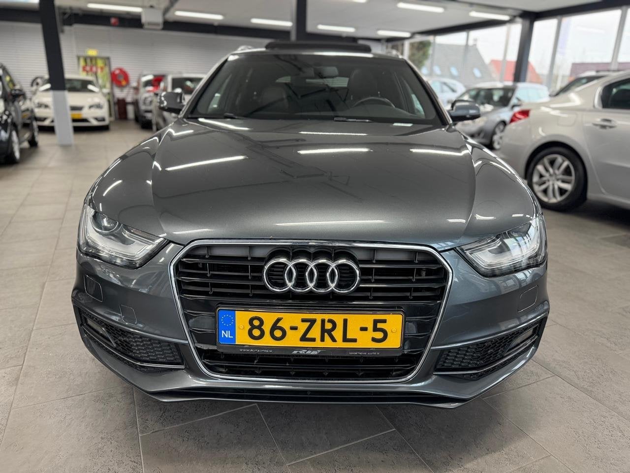 Audi A4 Avant 1.8 TFSI S Edition automaat panoramadak navi l, Auto's, Gebruikt, Zwart, 4 cilinders, 1505 kg