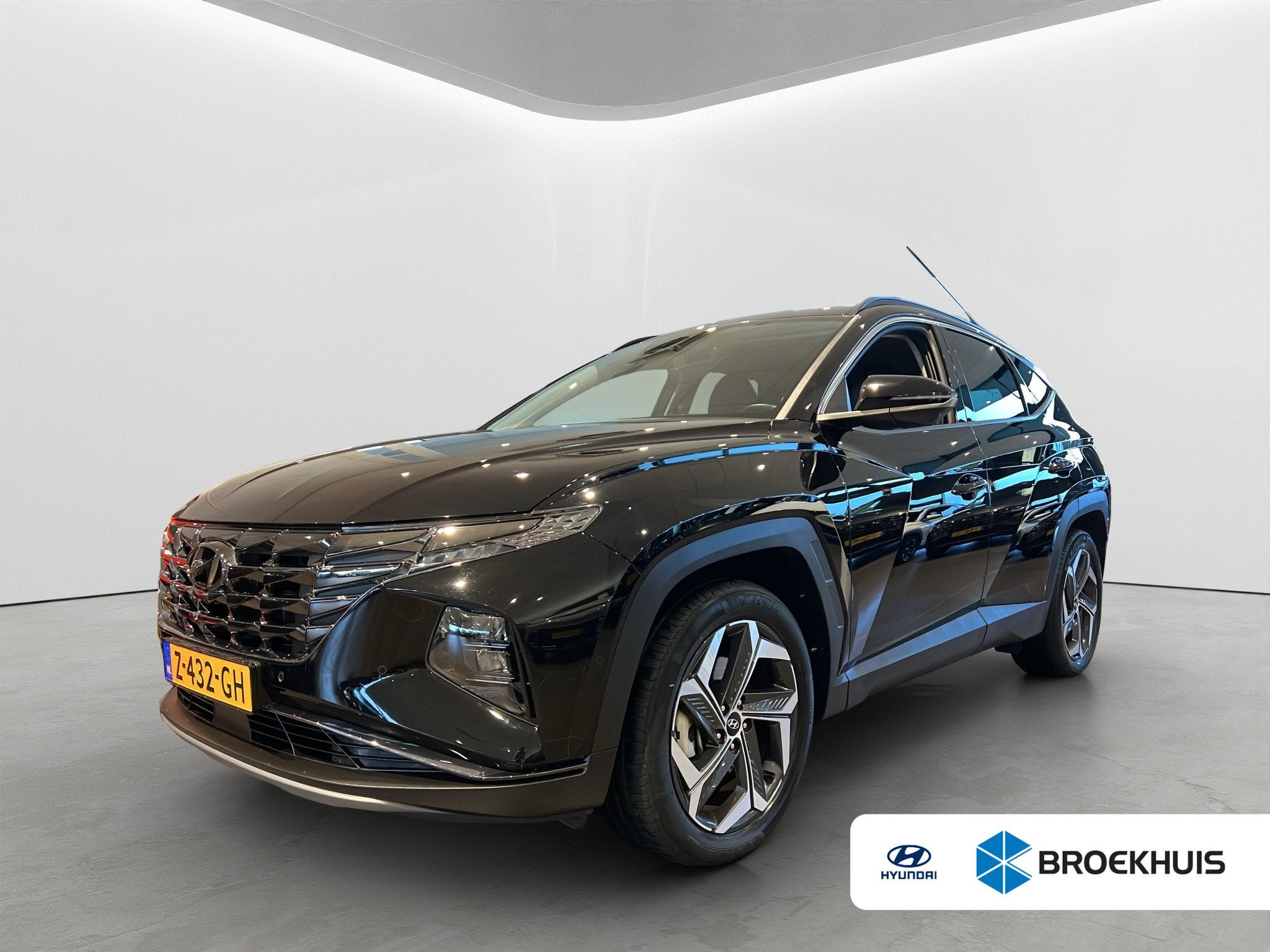 Hyundai Tucson 1.6 T-GDI 265pk PHEV Premium 4WD, Auto's, Hyundai, Gebruikt, 4 cilinders, Zwart, Bedrijf