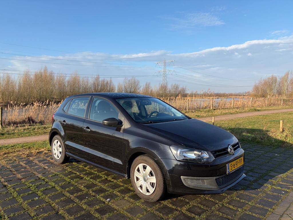Volkswagen Polo 1.2 51KW 2009 Zwart, Auto's, Volkswagen, Voorwielaandrijving, 40 €/maand, Zwart, 1198 cc