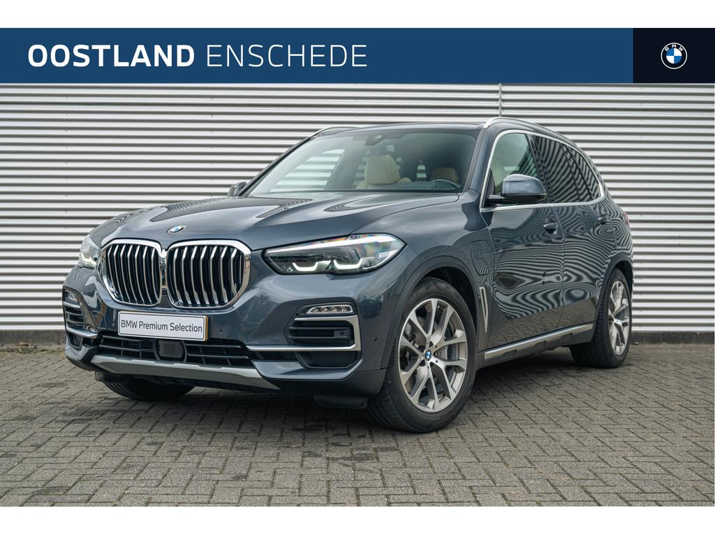 BMW X5 xDrive45e xLine Automaat / Panoramadak / Adaptief ond, Auto's, BMW, Gebruikt, 394 pk, Met garantie (alle), Leder