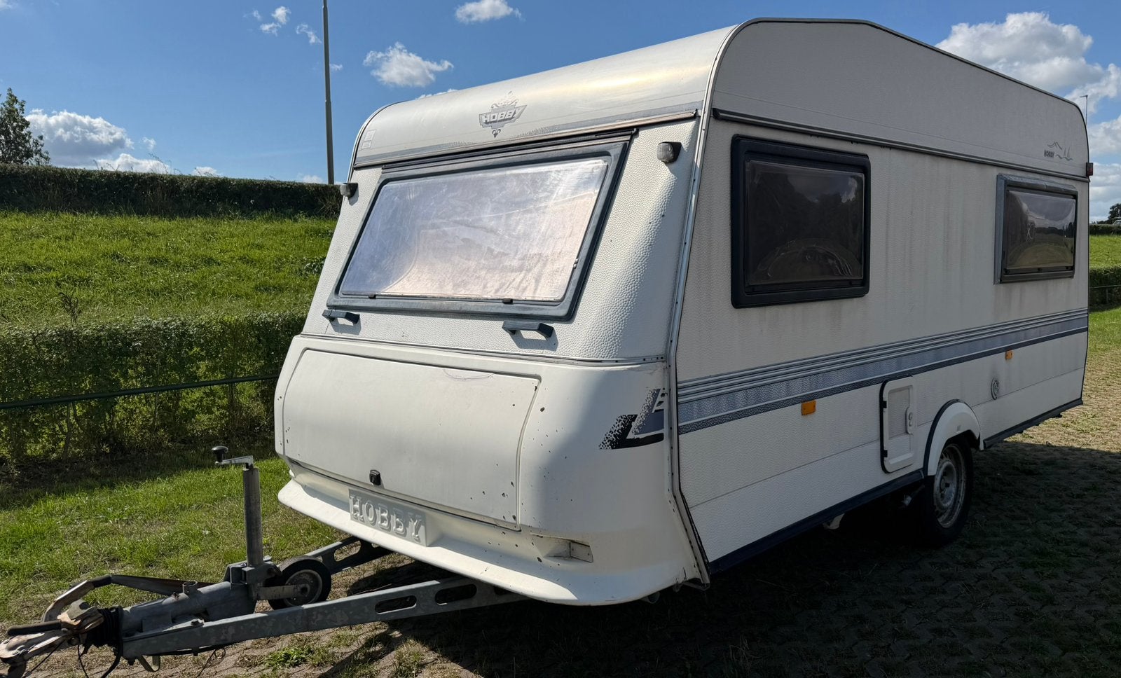 Hobby classic 10J te koop!, Caravans en Kamperen, Caravans, Vast bed, Hobby, Treinzit, 750 - 1000 kg
