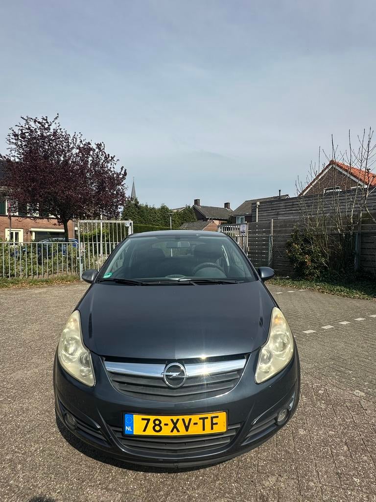 Opel Corsa 1.2 16V 3D WR 2007 Grijs airco-cruise-nw beurt, Auto's, Opel, Voorwielaandrijving, 450 kg, 40 €/maand, 1229 cc
