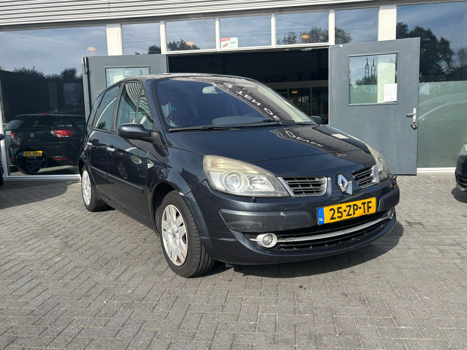 Renault Scénic 1.6 16V 82KW 2008 Grijs, Auto's, Stof, 4 cilinders, Origineel Nederlands, Bedrijf