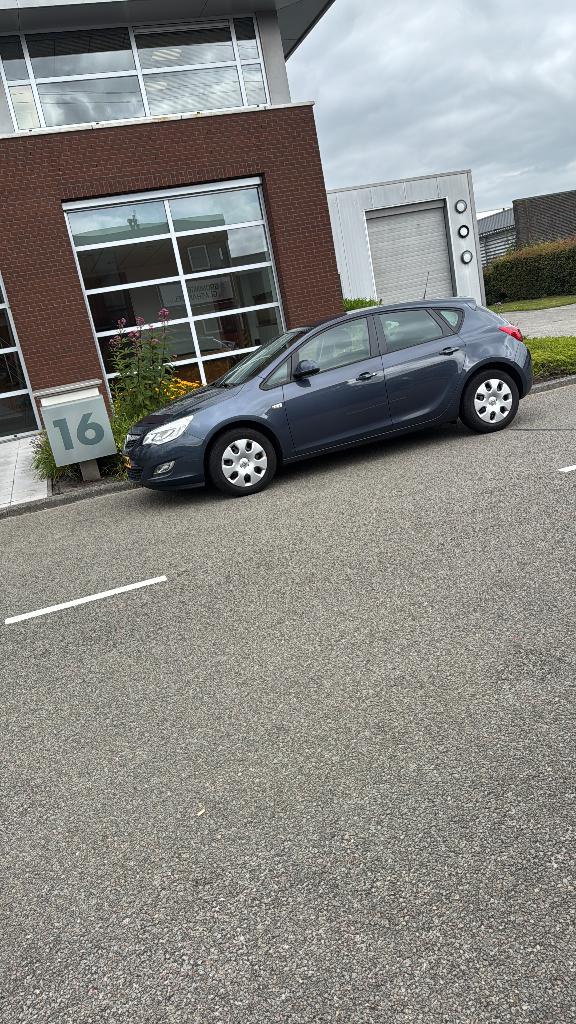 Opel Astra 1.4 Ecotec 74KW 5-D 2010 Blauw, Auto's, Voorwielaandrijving, Euro 5, 4 cilinders, Blauw
