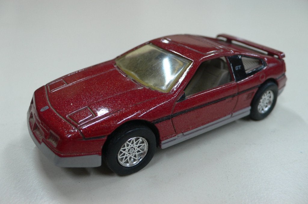 pontiac fiero 1988-ertl 1/43-, Verzenden, Nieuw, Auto, Overige merken