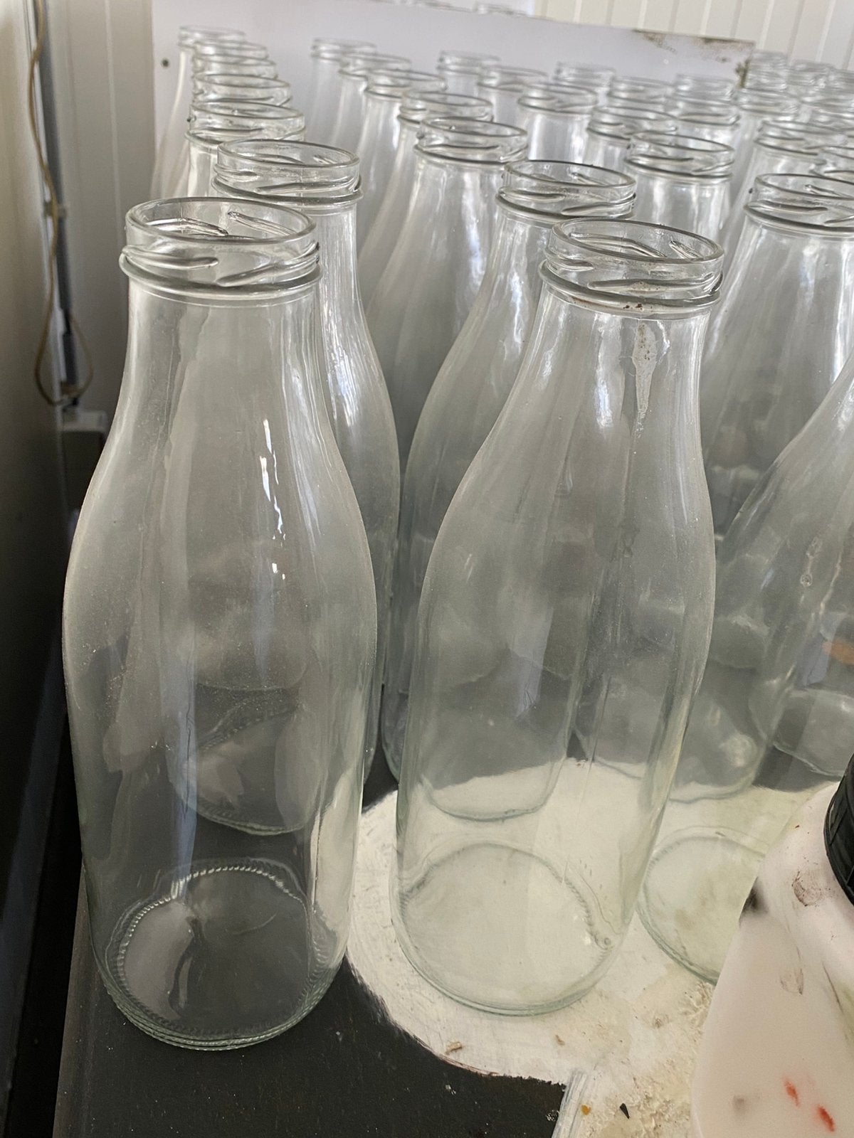 Flessen wit glas oud model melkfles, Ophalen