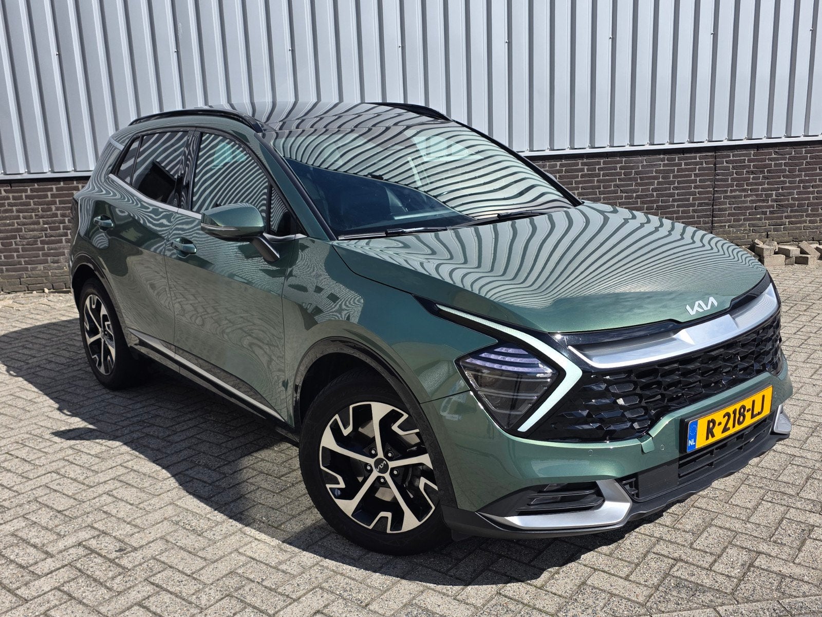 Kia Sportage PANO NAP 1.6 T-gdi 230pk Hybrid AT6 HEV, Auto's, Dealer onderhouden, Stof, Zwart, 4 cilinders