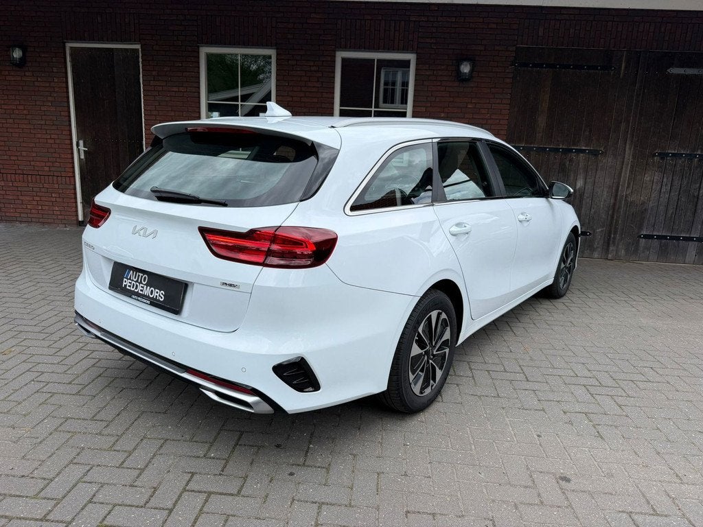 Kia Ceed Sportswagon 1.6 GDI PHEV DynamicPlusLine | 1e eigen, Auto's, Kia, 8 kWh, Gebruikt, Leder en Stof, Wit
