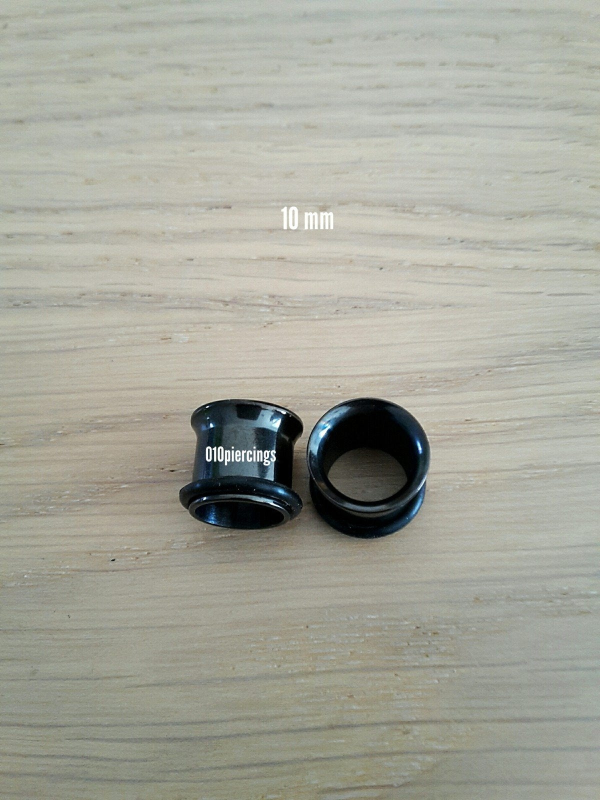 Nieuwe tunnels, pluggen. Staal. Zwart., Sieraden, Tassen en Uiterlijk, Piercings, Ophalen of Verzenden, Zo goed als nieuw, Staal
