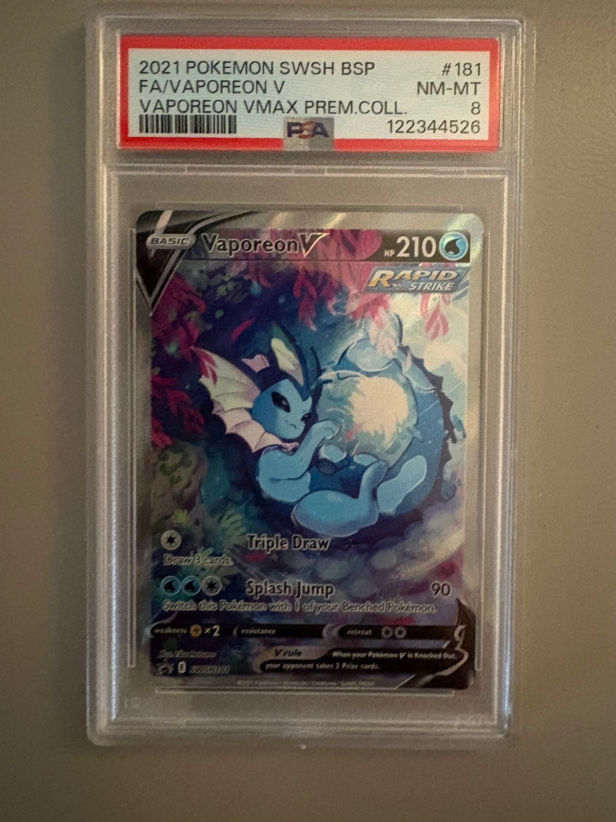 Vaporeon V Swsh 181| PSA 8, Ophalen of Verzenden, Zo goed als nieuw