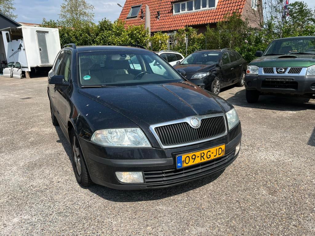Skoda Octavia Combi 1.9 TDI 77KW DSG 2005 Zwart, Auto's, Skoda, 4 cilinders, Zwart, 140 €/maand, 1896 cc