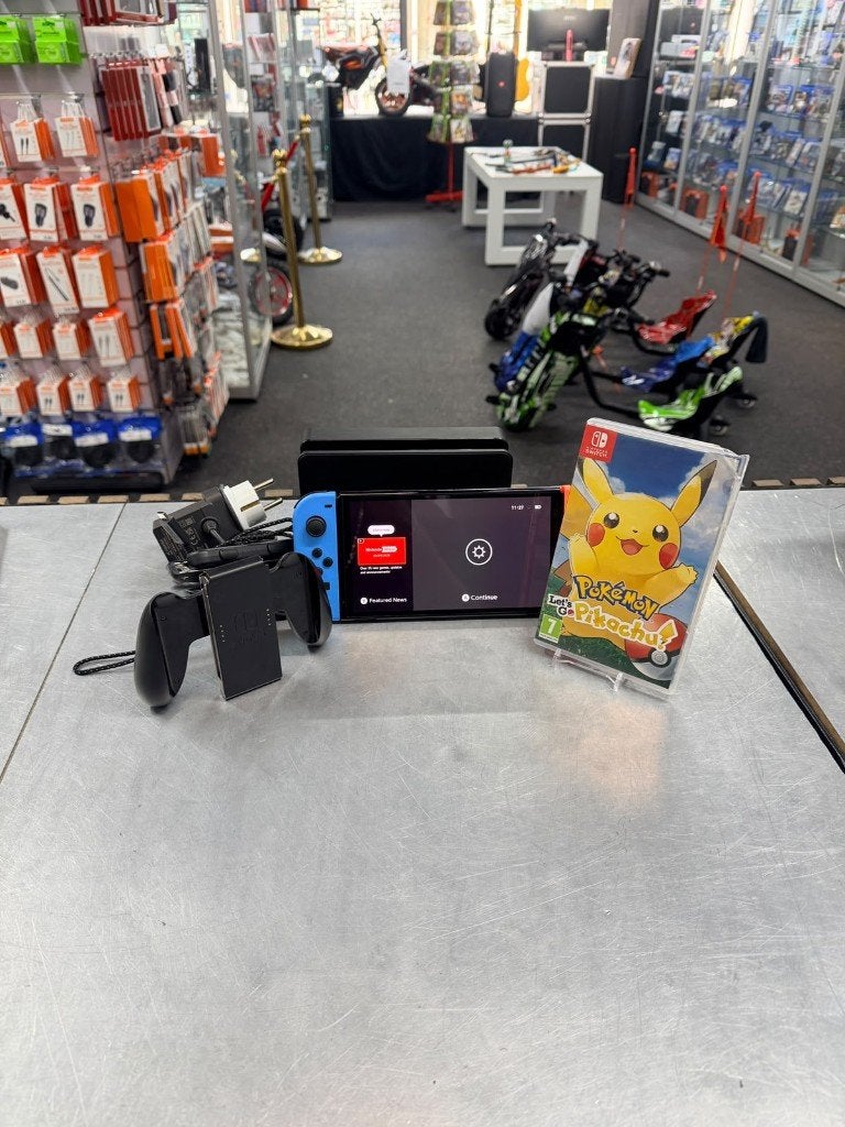 Nintendo Switch OLED 64GB + Dock + Pokémon Let's Go Pikachu, ., Nieuw, Ophalen of Verzenden, .