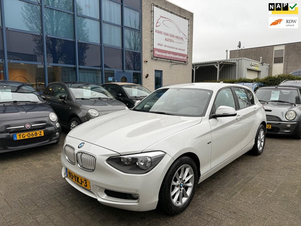 BMW 1-serie 118i Business+ Airco, Navi, APK 05/27, Auto's, BMW, Euro 5, Achterwielaandrijving, Gebruikt, Navigatiesysteem