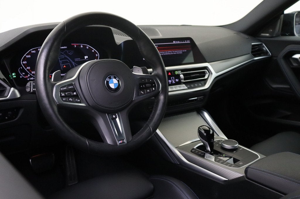 BMW 2 Serie Coupe M240i xDrive High Executive Automaat / Sch, Auto's, BMW, Gebruikt, Euro 6, Met garantie (alle), 4 stoelen