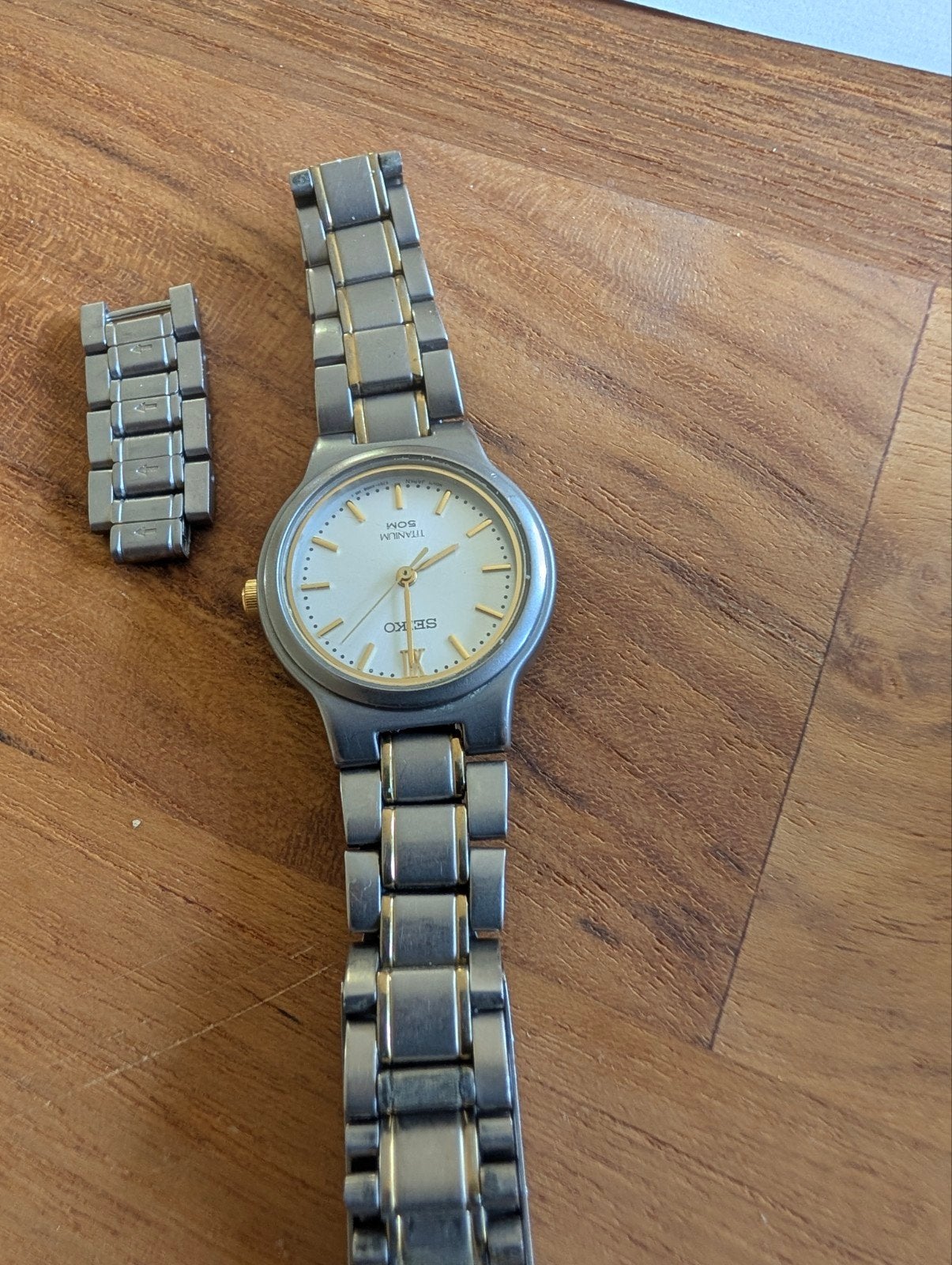 Seiko Titanium Horloge - V701-2L50 - Gebruikt, Ophalen of Verzenden, Staal, Seiko