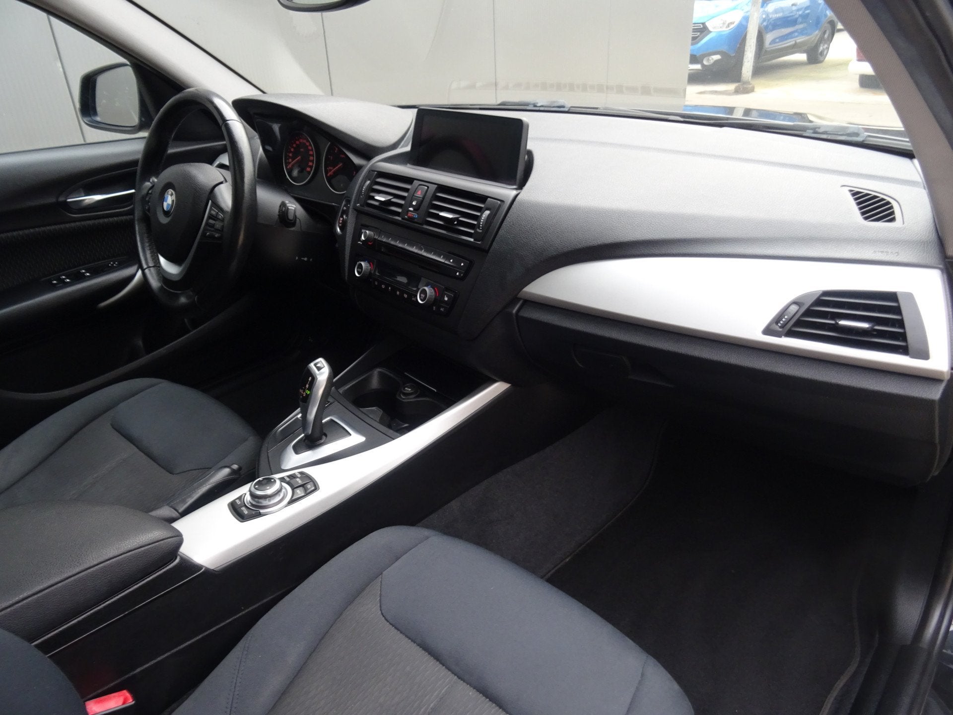 BMW 1-serie 116i Limited Edition * OPEN DAK * PDC * GR NAVIG, Auto's, Euro 5, Gebruikt, 4 cilinders, Zwart