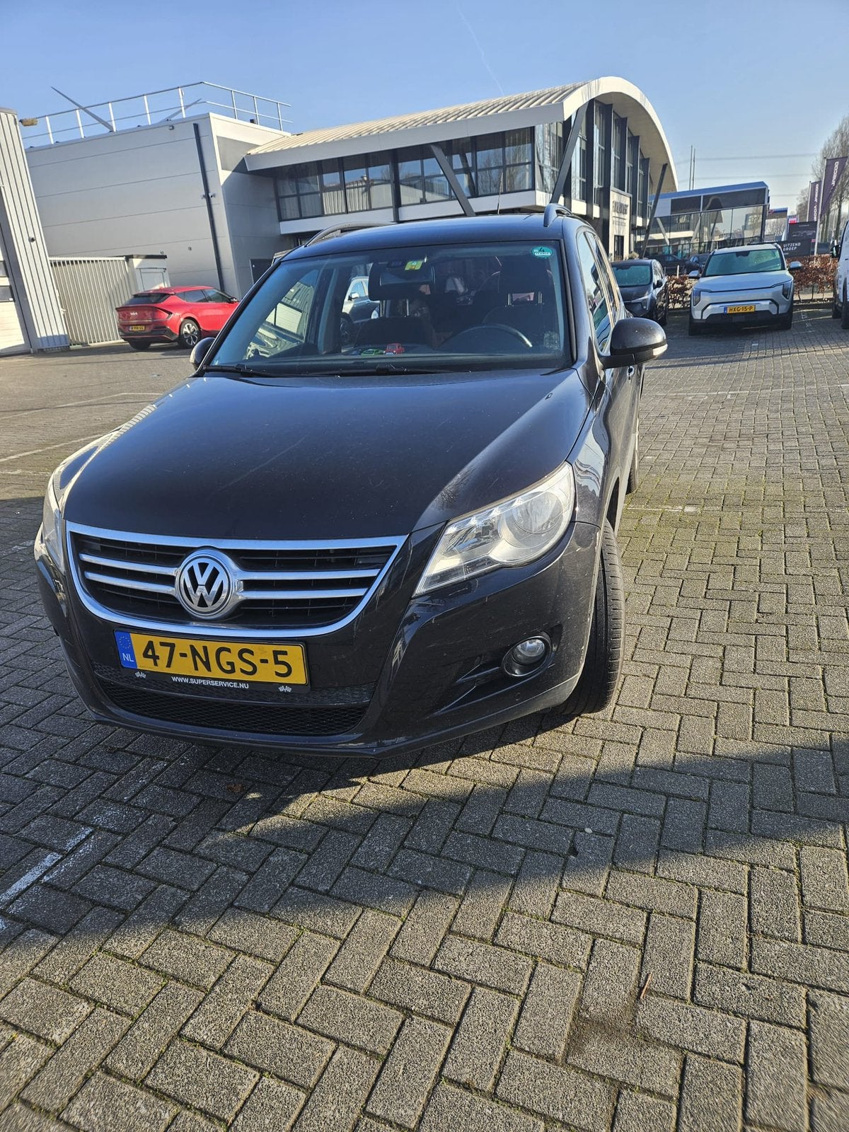 Volkswagen Tiguan 1.4 TSI 110KW 2010 Zwart, Auto's, Volkswagen, Voorwielaandrijving, 15 km/l, 1800 kg, 4 cilinders