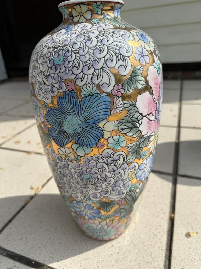 Gebloemde vaas, Ophalen