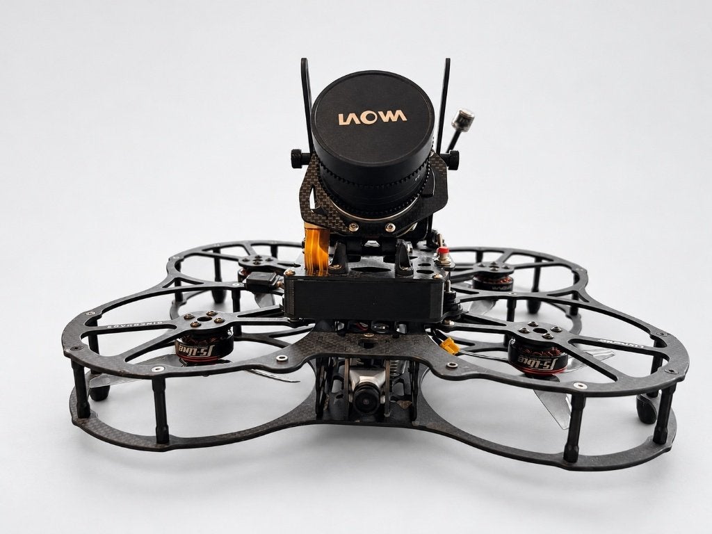 QAV-PRO Cinequads + naked Blackmagic 4K + Laowa 9mm cine, 250 tot 900 gram, Extra accu('s), 5 tot 10 kilometer, Zo goed als nieuw