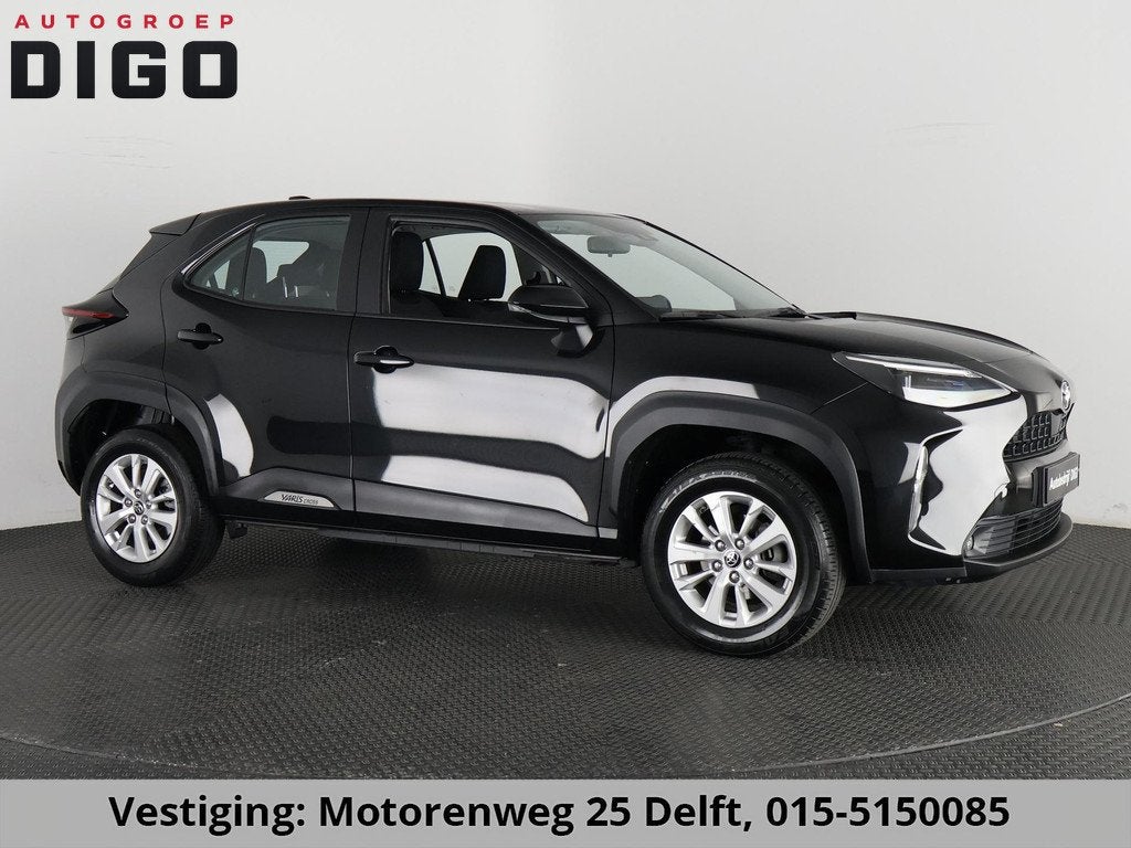 Toyota Yaris Cross 1.5 HYBRID ACTIVE BLACKLINE GARANTIE 2032, Stof, Gebruikt, 116 pk, Zwart