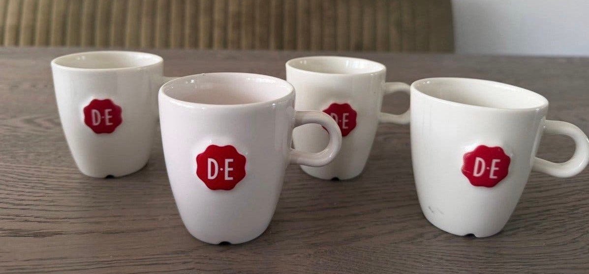Douwe Egberts Koffie kopjes, Ophalen of Verzenden, Zo goed als nieuw, Overige stijlen, Kop(pen) en/of Schotel(s)