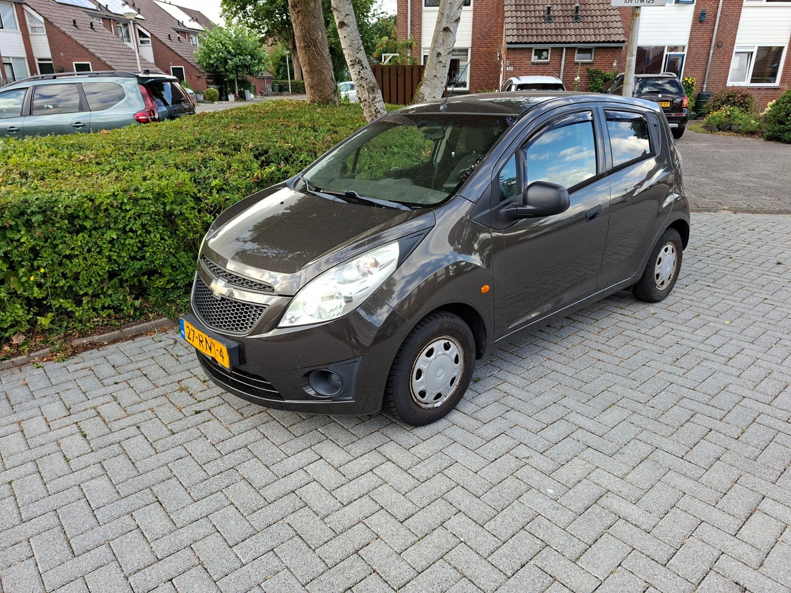 Chevrolet Spark 1.0 Bifuel 2011 Bruin, Voorwielaandrijving, 839 kg, 4 cilinders, Bruin