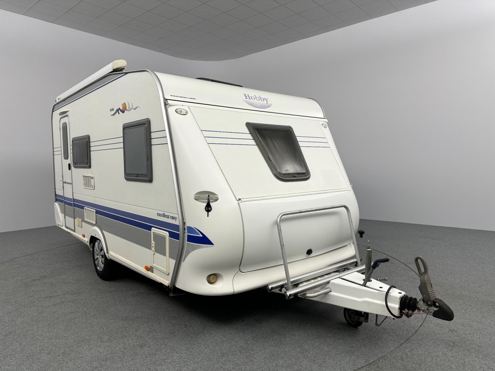 Hobby Excellent Easy 410 SFe Cassetteluifel Mover Fdrager, Caravans en Kamperen, Hordeur, Hobby, Bedrijf, Treinzit