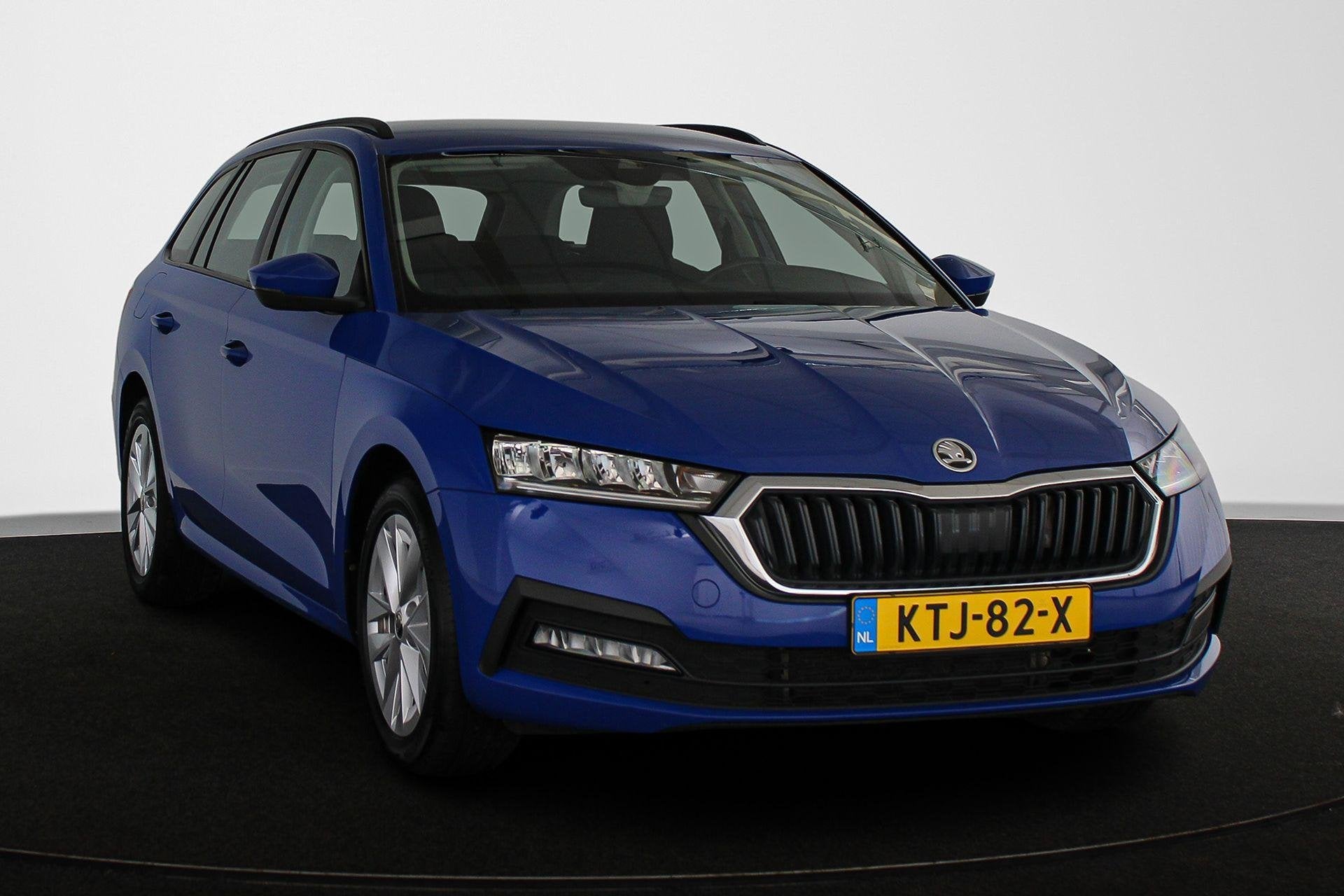 Skoda Octavia Combi 1.4 TSI iV PHEV Business Edition Keyless, Auto's, Stof, Gebruikt, 4 cilinders, Blauw