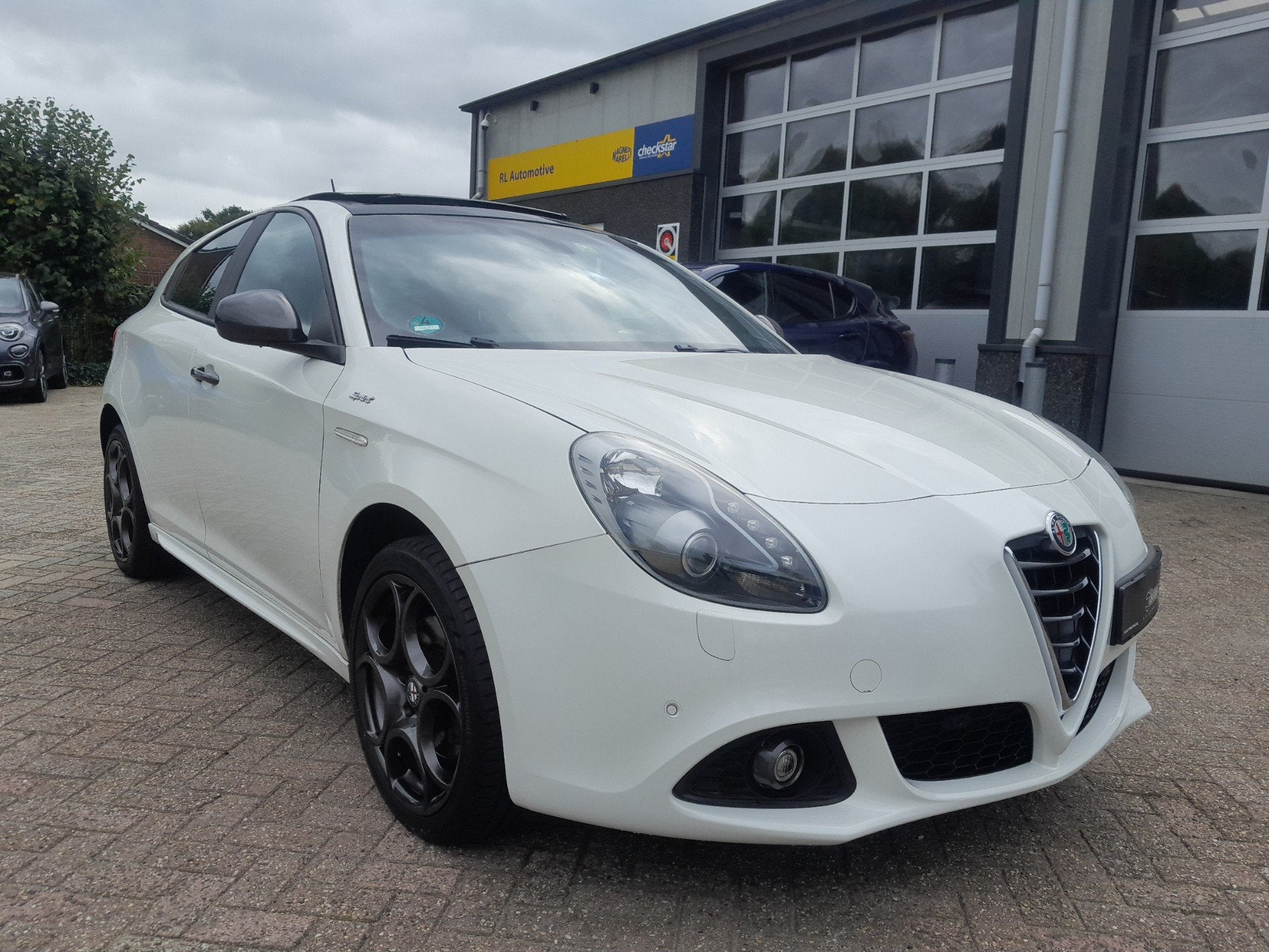 Alfa Romeo Giulietta 1.4 T Sprint - Schuif / kanteldak - Nav, Auto's, Voorwielaandrijving, Dealer onderhouden, Gebruikt, Euro 6