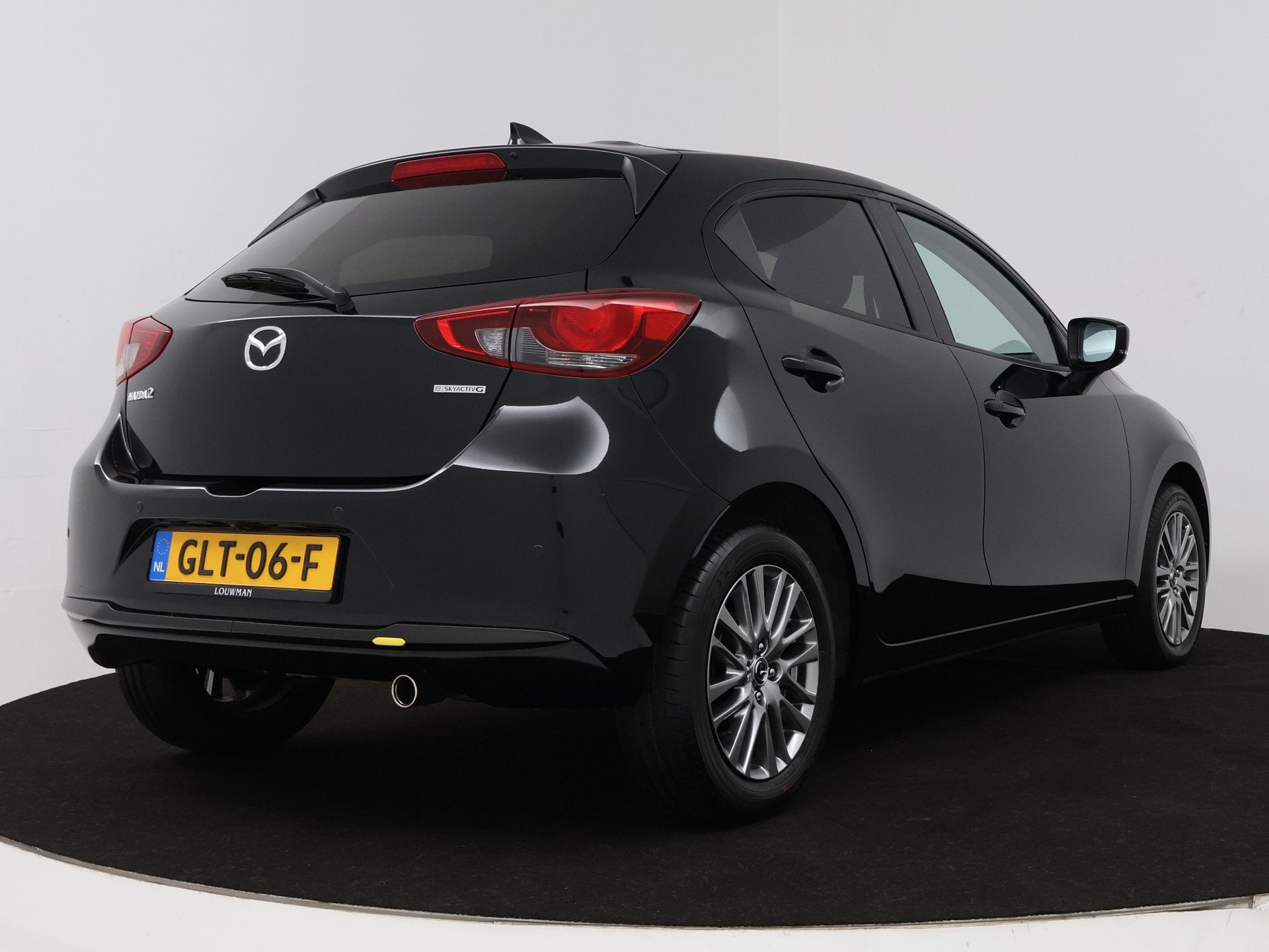 Mazda 2 1.5 e-SkyActiv-G 90 Exclusive-Line | Oa. Stuur en St, 12 maanden, Stof, 4 cilinders, Zwart
