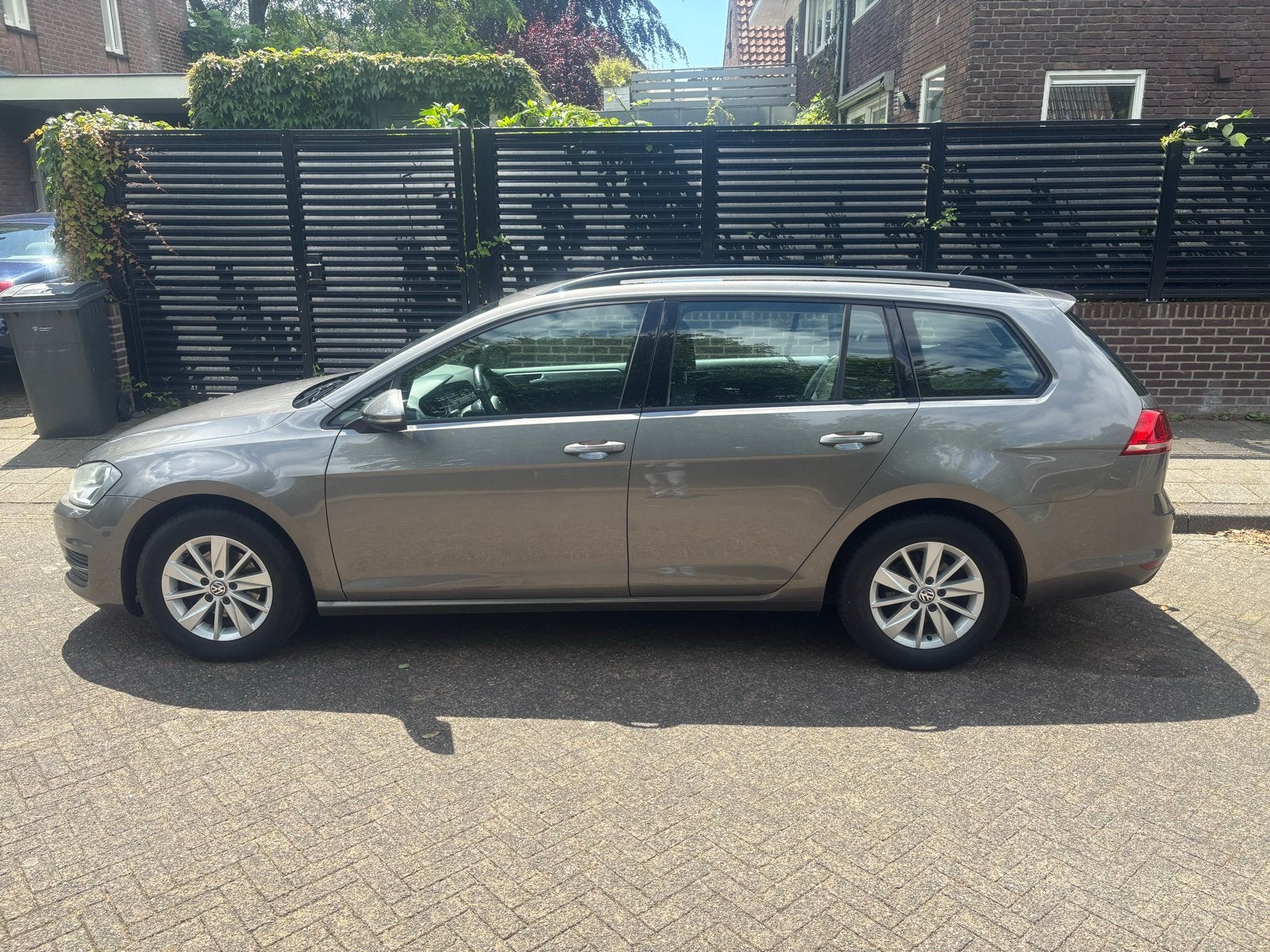 Volkswagen Golf 1.2 TSI 77KW/105PK Variant 2014 Grijs, Auto's, Voorwielaandrijving, Euro 5, Stof, Zwart