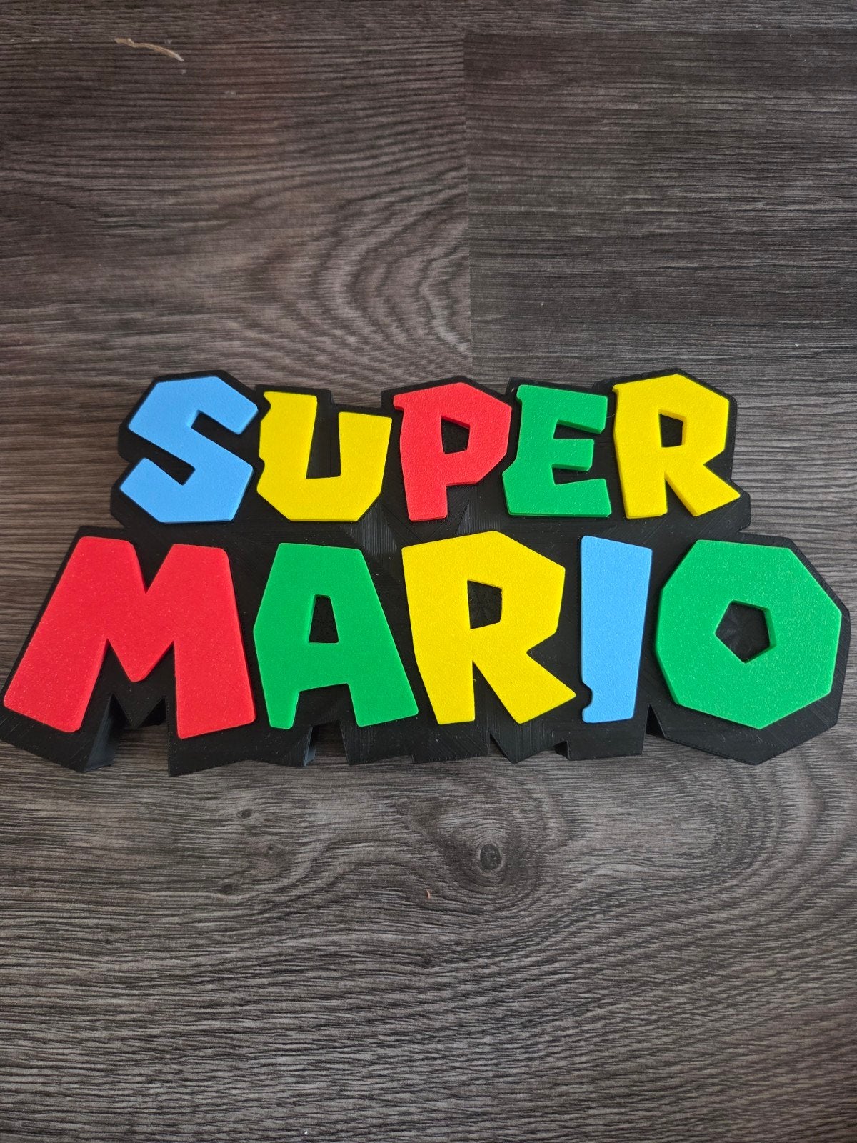 Super Mario logo decoratie - Perfect voor elke fan!, Ophalen of Verzenden, Nieuw, Jongen of Meisje