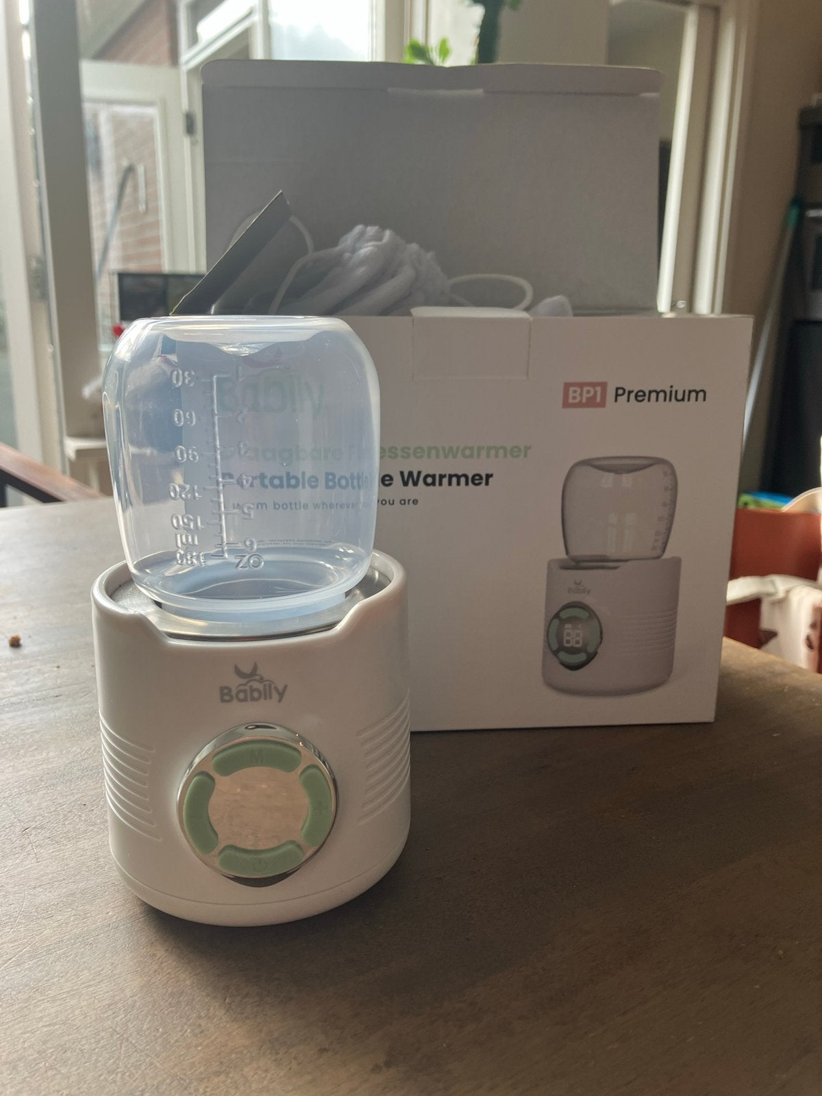 Babily Draagbare Flessenwarmer - Nieuw in doos, Ophalen of Verzenden, Nieuw, Flessen- of potjesverwarmer
