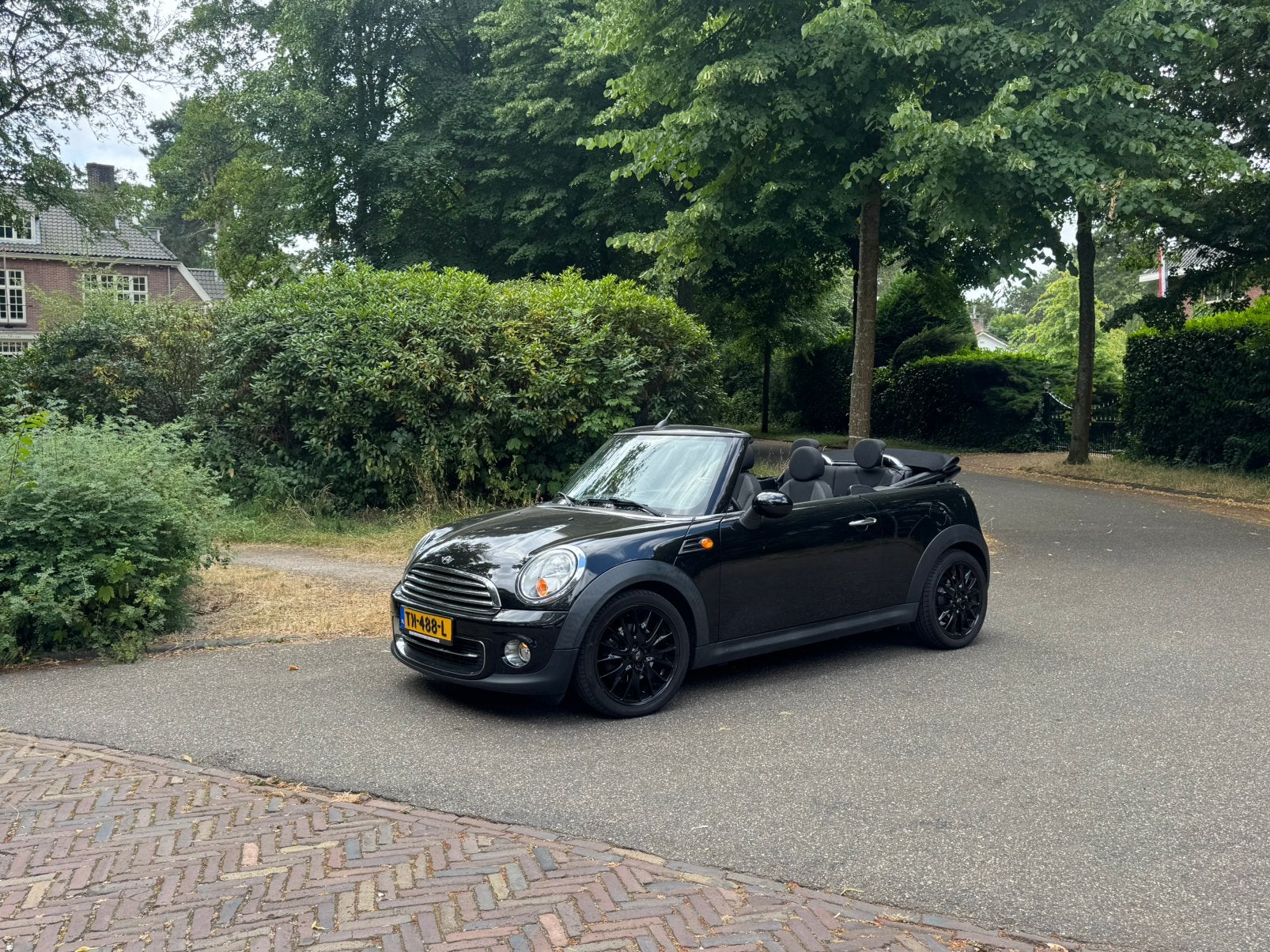 Mini Cabrio 1.6 ONE Zwart | gereviseerde motor en koppeling, Auto's, Voorwielaandrijving, 4 cilinders, Cabriolet, 4 stoelen